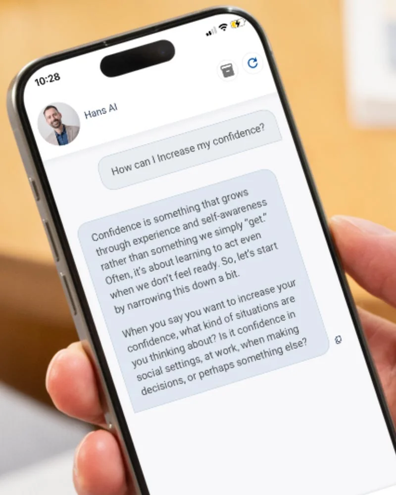 Hans AI conversation about increasing confidence, shown on a phone