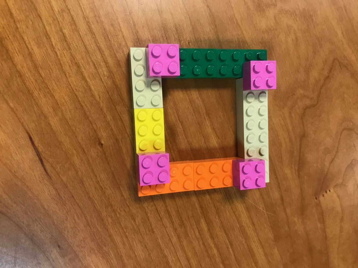 A LEGO® model of figures around a table